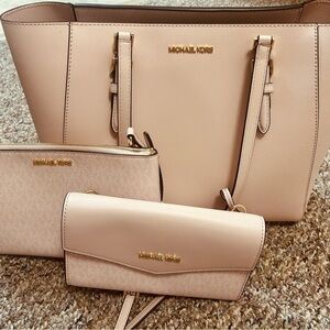 Michael Kors Elegant light pink 3 piece Tote and Wallet Set.